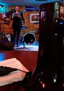 Dr. Kostis Kourelis, punk archaeologist and art historian with Franklin and Marshall College (Pennsylvania), gives his thoughts on punk archaeology through a PA after being introduced with a bullhorn.