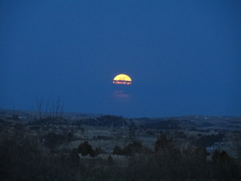Not long after the sun set in the west, I looked to the east and saw this moon rising. 