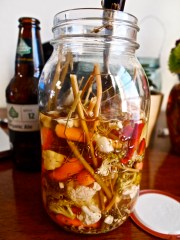 Getting pickled with jars of local farmer's market pickled vegetables.