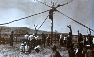 The building of a Crow Sun Dance Lodge from the 1940s. (Yellowtail, 2007: xviii)