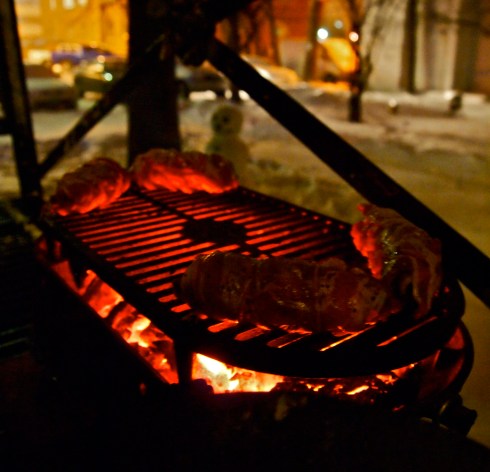 Grilling the roulade. The temps were sub-zero at this point. In the distance from the grill is a mildly creepy-looking snowman I built the night prior, in anticipation for the sub-zero weather.